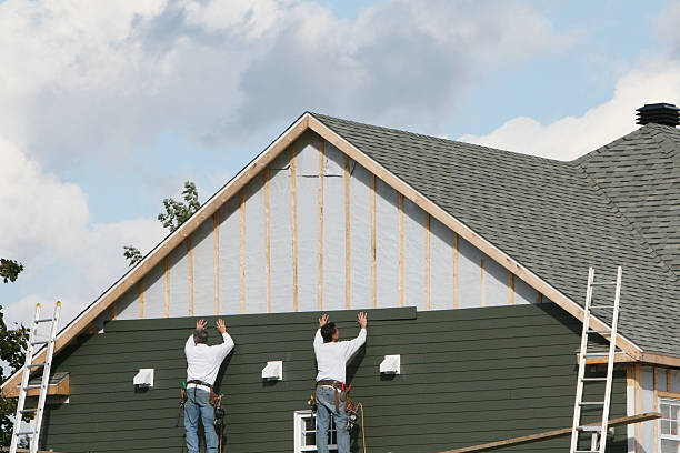 Professional Siding technician working in Boonville, NC